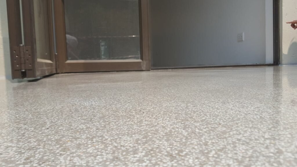 Indoor floor area ready for epoxy coating application by APR Waterproofing