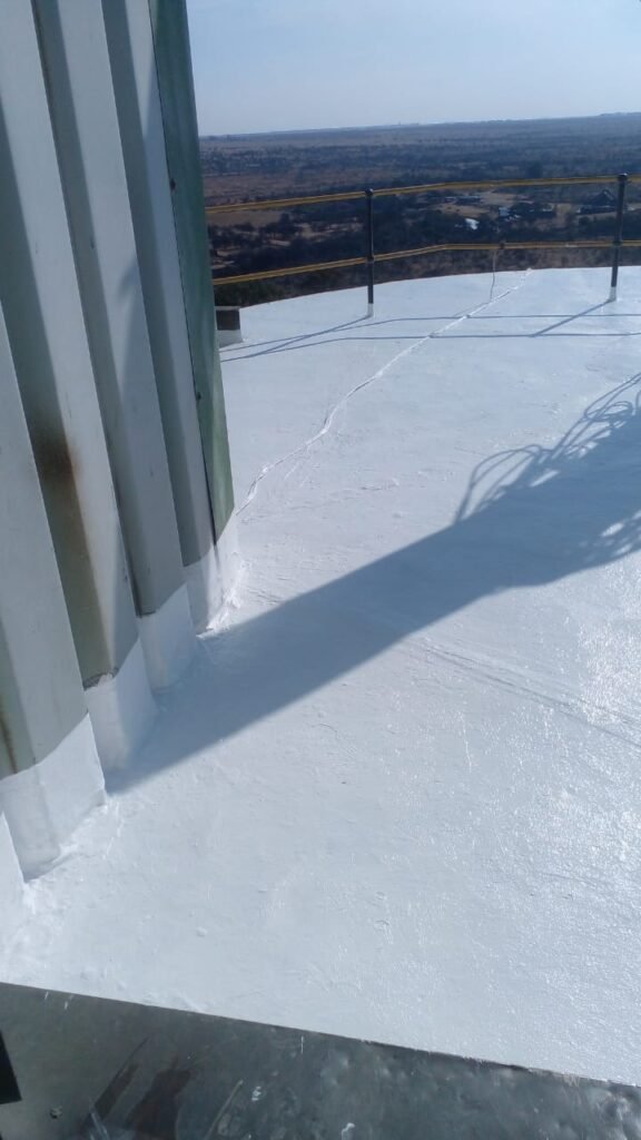 Close-up of the Corrugated Sheeting on a silo roof showing detailed painting and waterproofing by APR Waterproofing.