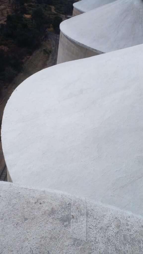 Silo roofs showing painting and waterproofing work by APR Waterproofing.