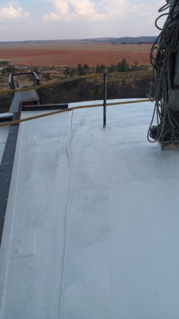 Close-up of completed Silo Roof Painting project by APR Waterproofing showing smooth waterproofing and paint finish.