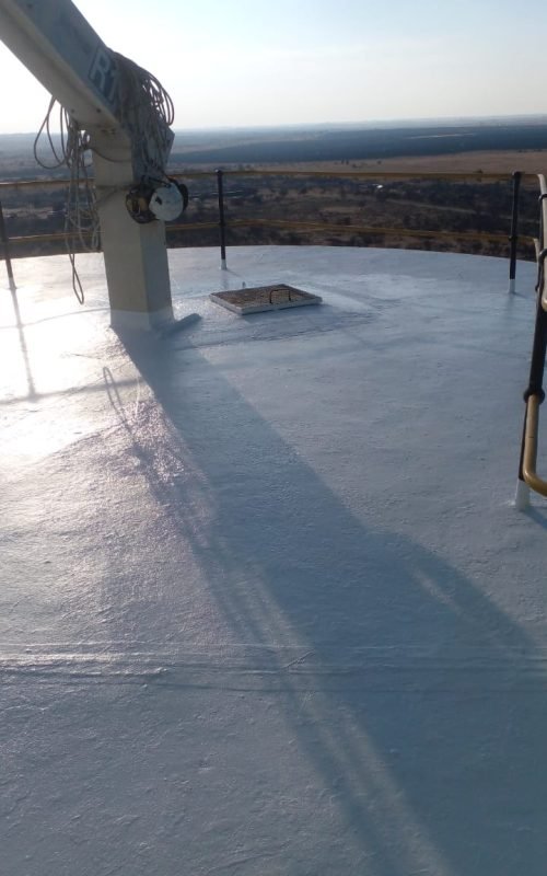 Flat silo roof treated by APR Waterproofing showing the completed waterproofing coating